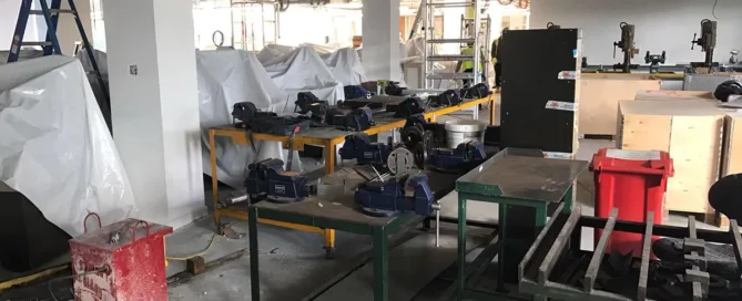Factory machinery being prepared for removal.