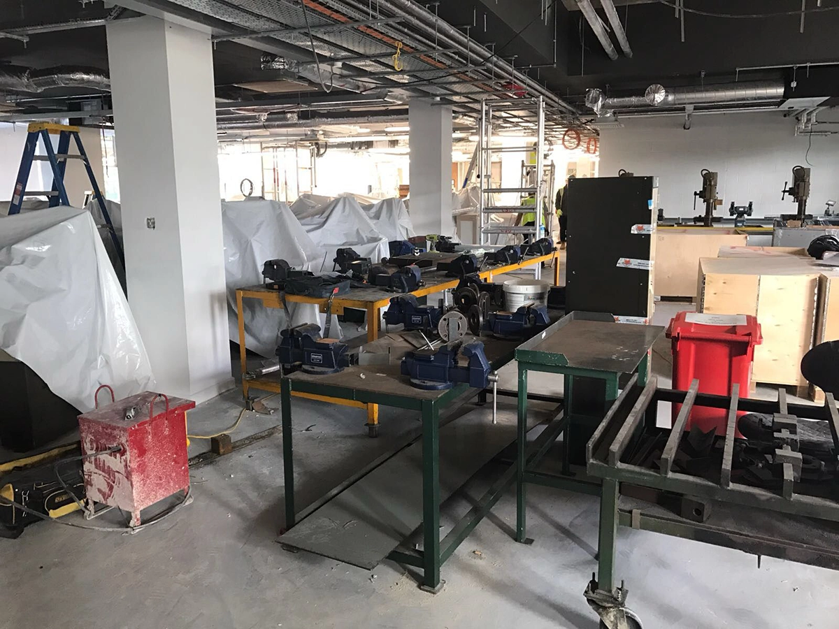 Factory machinery being prepared for removal.